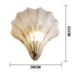 Snäckskalsformad vägglampa i glas och mässing - Bild 3