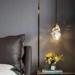 Snäckskalsformad vägglampa i glas och mässing - Bild 2